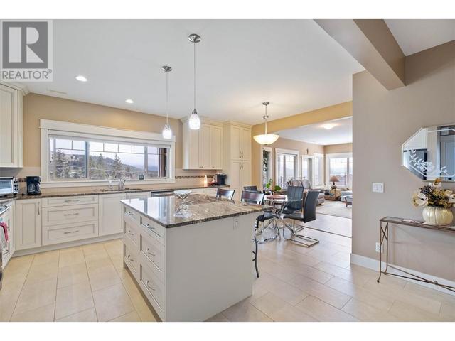 1297 Tanemura Crescent, House detached with 4 bedrooms, 4 bathrooms and 3 parking in Kelowna BC | Image 39