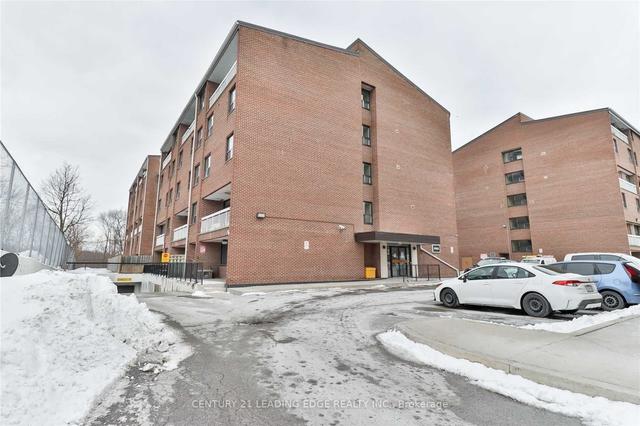 309 - 4064 Lawrence Ave, Condo with 2 bedrooms, 1 bathrooms and 1 parking in Toronto ON | Image 1