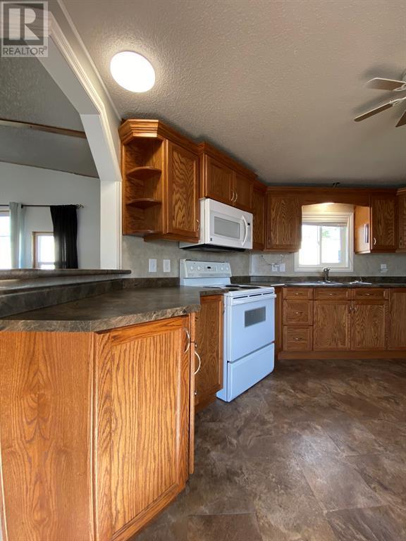 35, - 600 14 Street, Home with 3 bedrooms, 2 bathrooms and 2 parking in Beaverlodge AB | Card Image
