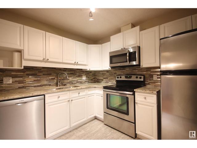 211 - 17151 94a Av Nw, Condo with 2 bedrooms, 2 bathrooms and 1 parking in Edmonton AB | Image 6