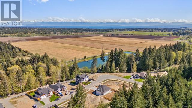 3289 Klanawa Cres, House detached with 4 bedrooms, 3 bathrooms and 4 parking in Courtenay BC | Image 4