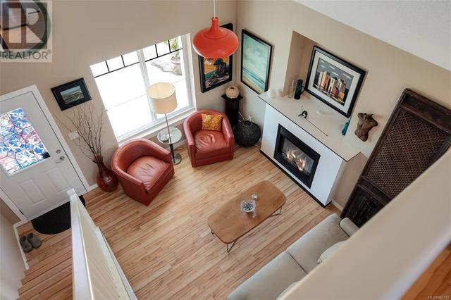 View from the loft to the main living area. | Image 18