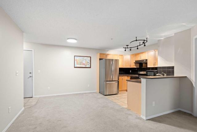 1124 - 60 Panatella Street Nw, Condo with 2 bedrooms, 2 bathrooms and 1 parking in Calgary AB | Image 5