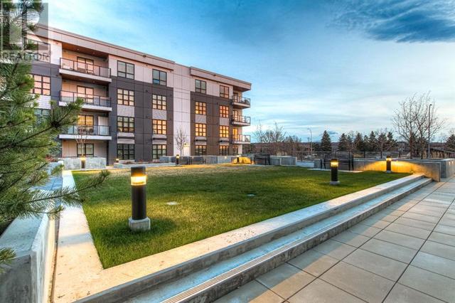 303, - 383 Smith Street Nw, Condo with 1 bedrooms, 2 bathrooms and 1 parking in Calgary AB | Image 21
