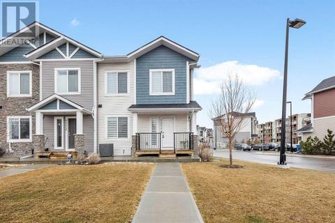 1171 Channelside Drive Sw, House attached with 3 bedrooms, 3 bathrooms and 2 parking in Airdrie AB | Card Image