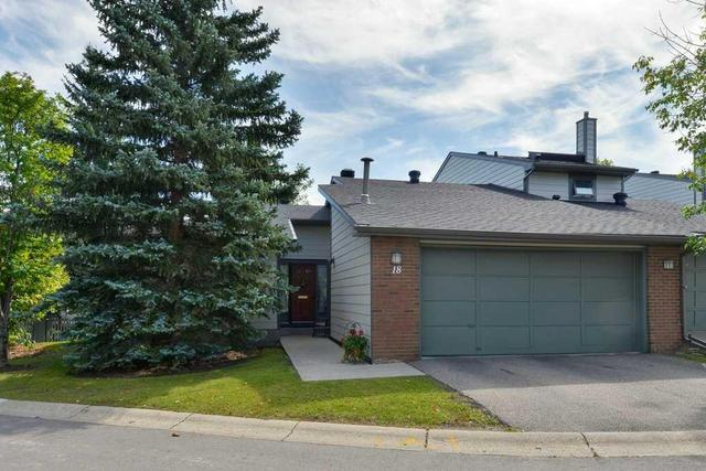18 - 185 Woodridge Drive Sw, Home with 3 bedrooms, 3 bathrooms and 4 parking in Calgary AB | Image 1