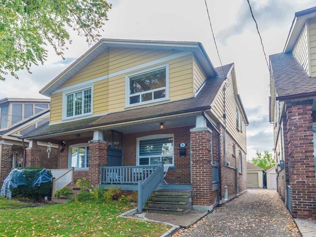 91 Wolverleigh Blvd, House semidetached with 3 bedrooms, 2 bathrooms and 3 parking in Toronto ON | Image 1