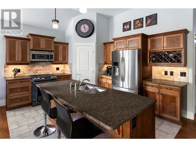 105 - 4450 Gordon Drive, House detached with 4 bedrooms, 3 bathrooms and 4 parking in Kelowna BC | Image 5