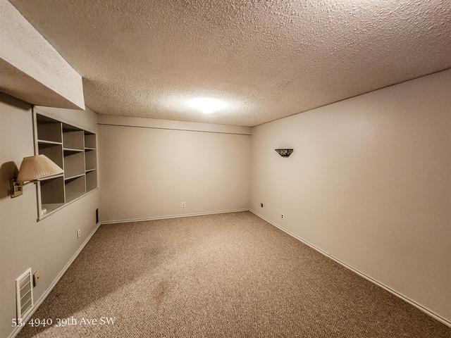 53 - 4940 39 Avenue Sw, Home with 3 bedrooms, 1 bathrooms and 1 parking in Calgary AB | Image 24