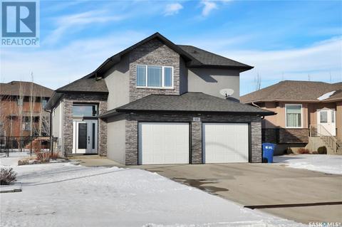59 Emerald Ridge E, House detached with 4 bedrooms, 3 bathrooms and null parking in White City SK | Card Image
