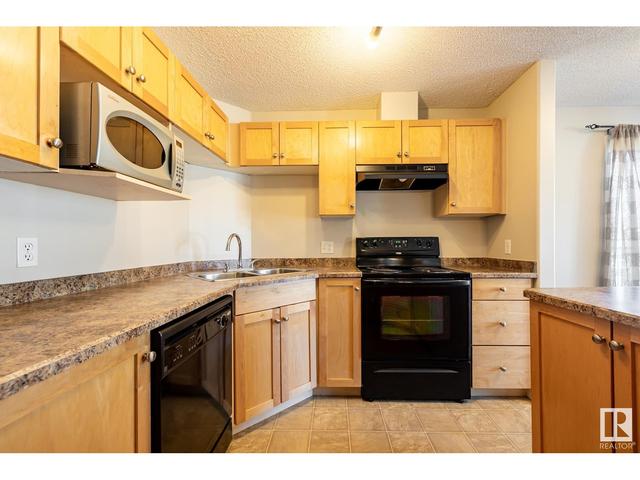 104 - 111 Edwards Dr Sw, Condo with 2 bedrooms, 2 bathrooms and null parking in Edmonton AB | Image 2