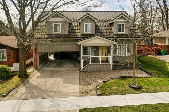 899 Cumberland Ave, House detached with 8 bedrooms, 5 bathrooms and 4 parking in Peterborough ON | Image 1