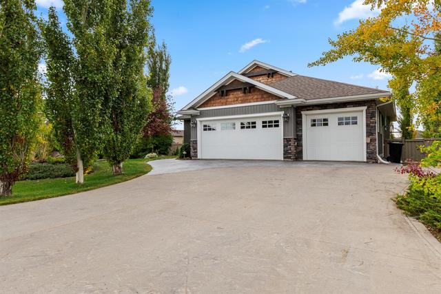 10521 160 Ave, House detached with 6 bedrooms, 4 bathrooms and 10 parking in Grande Prairie County No. 1 AB | Image 2