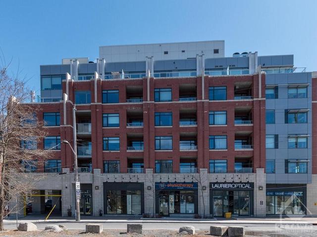 211 - 60 Springhurst Avenue, Condo with 1 bedrooms, 2 bathrooms and 1 parking in Ottawa ON | Image 1