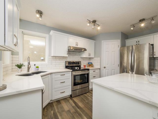 6 Sierra Nevada Green Sw, House detached with 4 bedrooms, 3 bathrooms and 4 parking in Calgary AB | Image 5