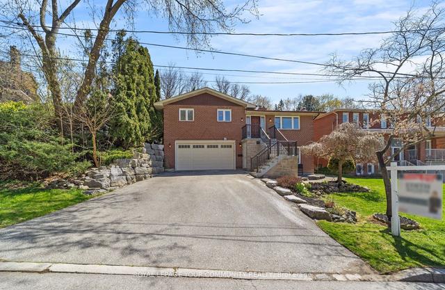 63 Riverside Dr, House detached with 5 bedrooms, 3 bathrooms and 6 parking in Toronto ON | Image 23