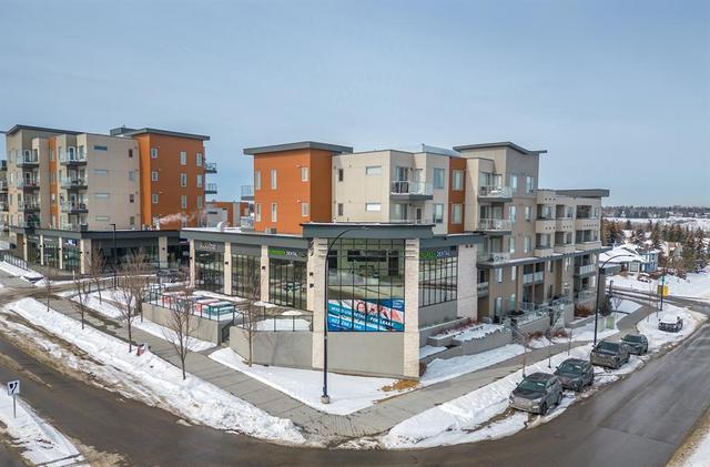208 - 30 Shawnee Common Sw, Condo with 2 bedrooms, 2 bathrooms and 1 parking in Calgary AB | Image 20