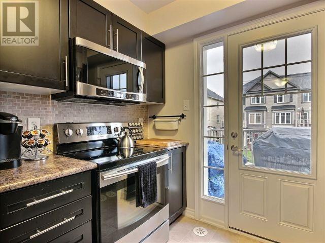 2605 Baynes Sound Way, House attached with 2 bedrooms, 2 bathrooms and 2 parking in Ottawa ON | Image 5