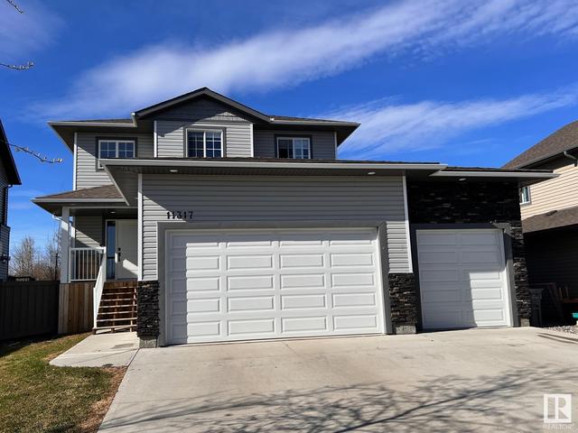11317 59 Av, House detached with 4 bedrooms, 3 bathrooms and null parking in Grande Prairie AB | Card Image