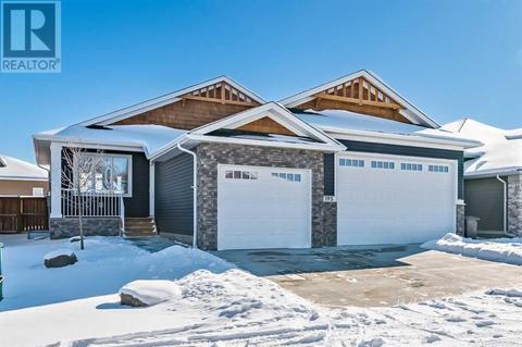 195 Riverwood Crescent, House detached with 4 bedrooms, 3 bathrooms and 4 parking in Black Diamond AB | Card Image
