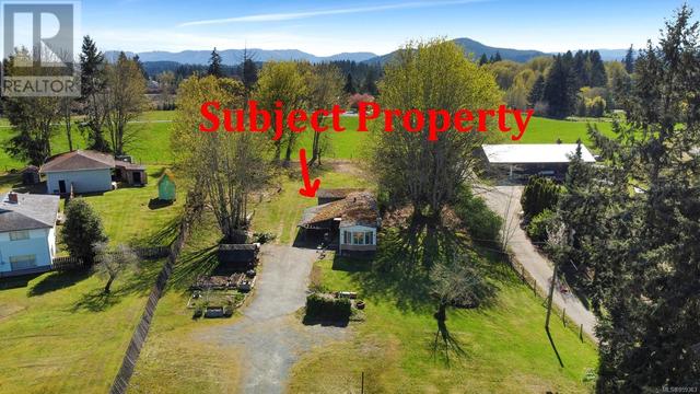 Beautiful 1 acre building lot in Cowichan Bay with both mountain and pastoral views to the North and pastoral views to the South | Image 1
