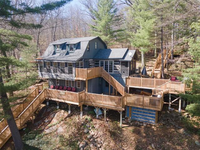 unit 9 - 1519 Highway 118 Rd W, House detached with 2 bedrooms, 2 bathrooms and 10 parking in Muskoka Lakes ON | Image 1