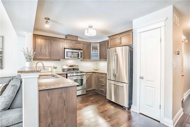 26 Couling Crescent Crescent, House attached with 3 bedrooms, 2 bathrooms and 2 parking in Guelph ON | Image 6