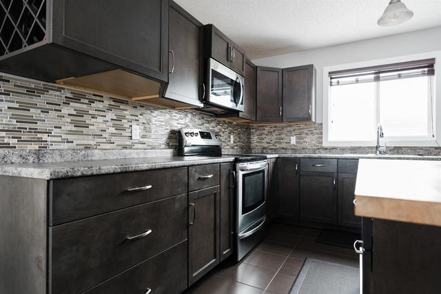128 Coventry Drive, Home with 4 bedrooms, 3 bathrooms and 4 parking in Wood Buffalo AB | Image 10