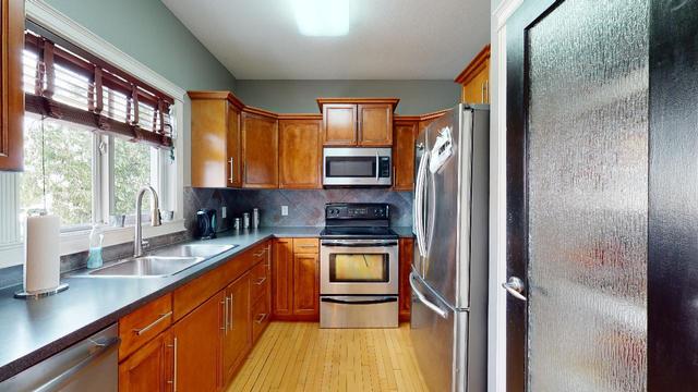 246 Pacific Crescent, House detached with 3 bedrooms, 2 bathrooms and 2 parking in Wood Buffalo AB | Image 16