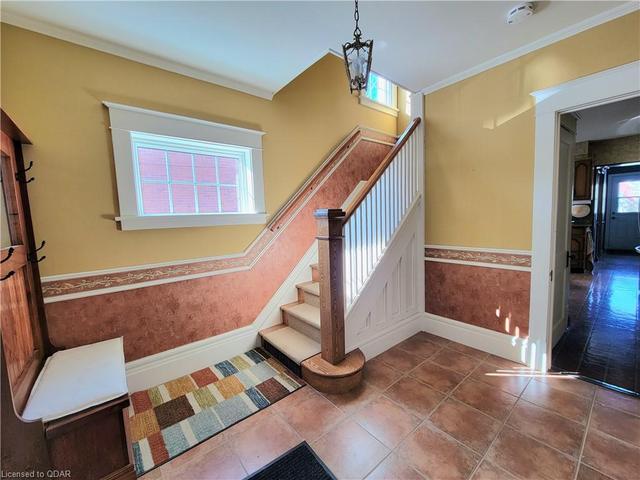 Stairs to 2nd floor and entry to kitchen | Image 34