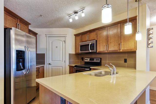 2212 - 175 Panatella Hill Nw, Condo with 2 bedrooms, 2 bathrooms and 1 parking in Calgary AB | Image 6