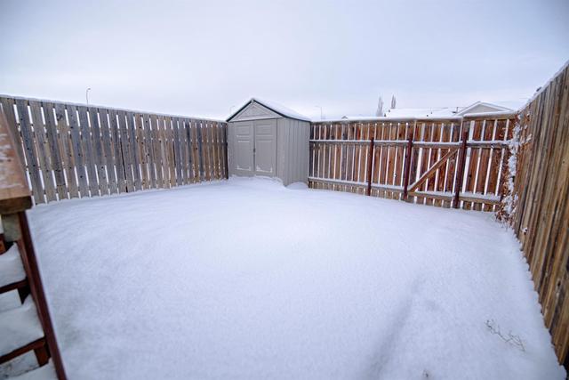 195 Blackfoot Boulevard W, Home with 4 bedrooms, 2 bathrooms and 2 parking in Lethbridge County AB | Image 5