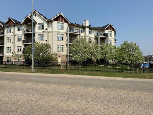 211 - 100 Lakeway Boulevard, Condo with 2 bedrooms, 2 bathrooms and 2 parking in Sylvan Lake AB | Image 1