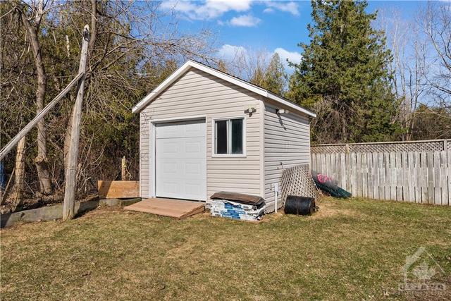 Shed is included.  Has concrete floor.  It is insulated and drywalled and has power. | Image 27
