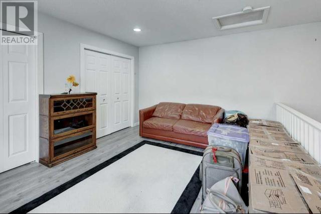 The loft makes a great place for guests / home office / workout room. Lots of storage in the double closets | Image 21