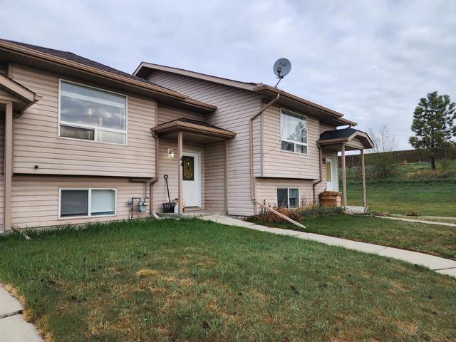 44 Kenny Close, Home with 3 bedrooms, 2 bathrooms and 1 parking in Red Deer AB | Image 1