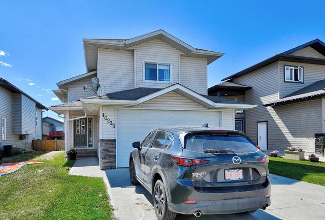 10235 93 Street, House detached with 5 bedrooms, 3 bathrooms and 4 parking in Sexsmith AB | Image 1