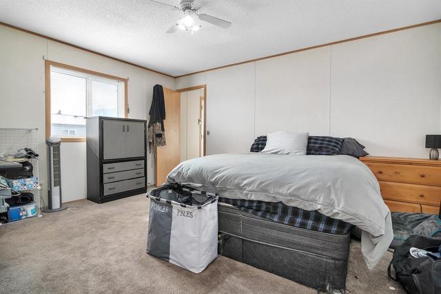 6 Meadowplace Crescent E, Home with 3 bedrooms, 2 bathrooms and 2 parking in Brooks AB | Image 10