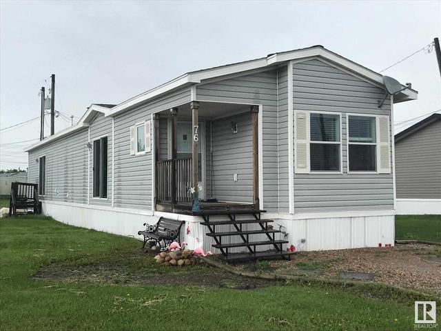 76 Wood&Garden Es, Home with 3 bedrooms, 2 bathrooms and null parking in Vegreville AB | Card Image