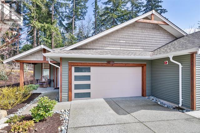 Front of home with double garage and large driveway (parking for 6) | Image 1
