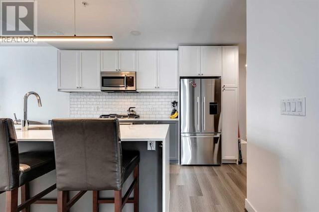 602, - 327 9a Street Nw, Condo with 2 bedrooms, 2 bathrooms and 1 parking in Calgary AB | Image 3