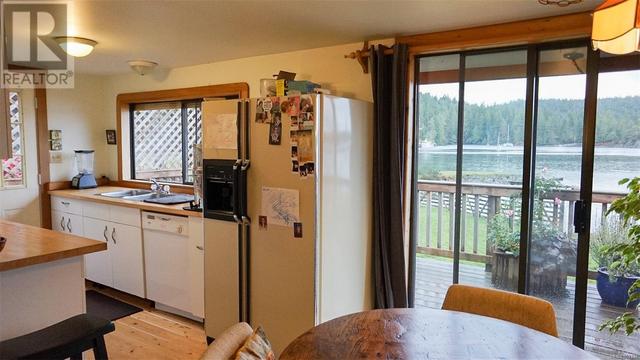 969 Whaletown Rd, House detached with 6 bedrooms, 5 bathrooms and 20 parking in Strathcona B BC | Image 26