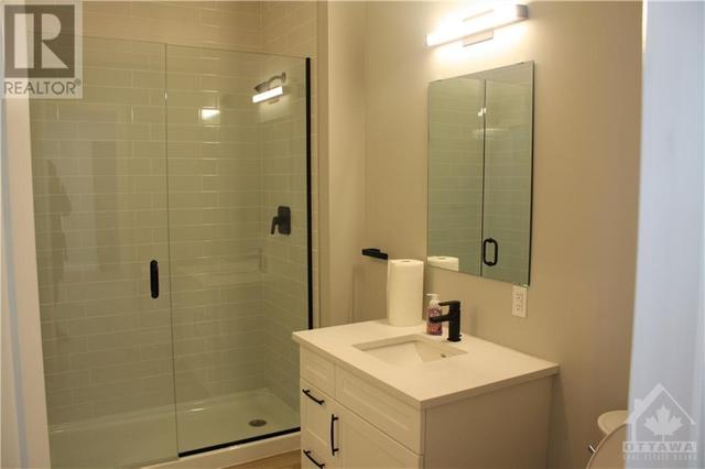 3-piece bath with walk-in shower and cheater ensuite access from bedroom | Image 20