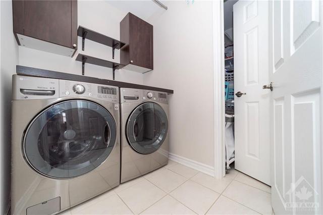 Finished second level laundry room | Image 28