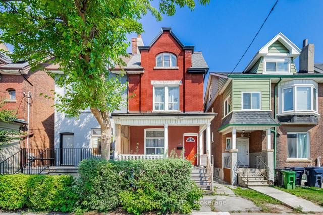 641 Bathurst St, House semidetached with 5 bedrooms, 3 bathrooms and 2 parking in Toronto ON | Image 1