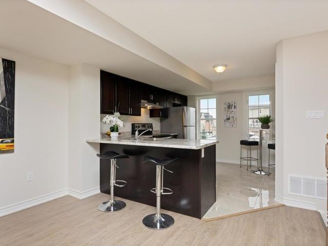 118 - 1380 Costigan Rd, Townhouse with 2 bedrooms, 3 bathrooms and 1 parking in Milton ON | Image 2