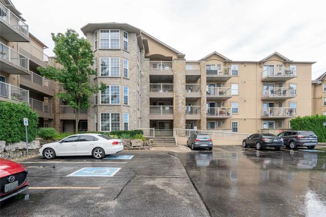 408 - 1820 Walker's Line, Condo with 1 bedrooms, 1 bathrooms and 1 parking in Burlington ON | Card Image