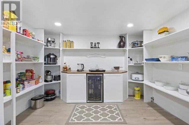 Beautiful walk in pantry directly off the kitchen area | Image 13