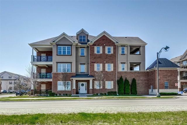 205 - 275 Littlewood Dr, Townhouse with 2 bedrooms, 2 bathrooms and 2 parking in Oakville ON | Image 1