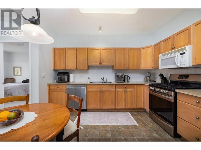 106 - 1235 Klo Road, Condo with 2 bedrooms, 2 bathrooms and 1 parking in Kelowna BC | Image 6